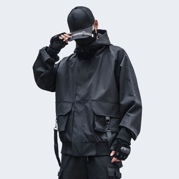 Man wearing black bybb cargo jacket zipper closure