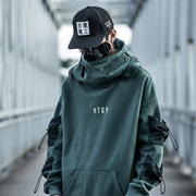 Man wearing green htgy hoodie big pockets on the front
