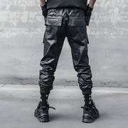 Unisex wearing black bybb waterproof techwear pants