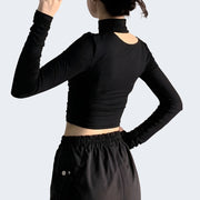 Woman wearing Bandage top long sleeve goth top