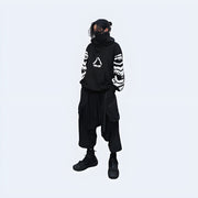 Front view of black 11 BYBB’s Dusk Hoodie – minimalist cyberpunk techwear design with oversized fit and adjustable hood.