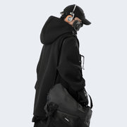 Man wearing 11 bybbs hoodie black back view