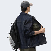Man wearing black cargo denim jacket multiple pockets