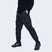 Man wearing black cargo skinny pants elastic waist
