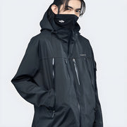 Man wearing black catsstac techwear hoodie zipper closure