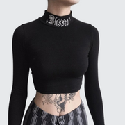 Women wearing black high neck long sleeve goth top