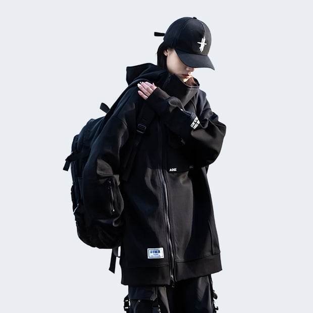 Man wearing black japanese techwear hoodie adjustable hood