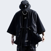 Man wearing black noragi jacket multiple pockets decoration