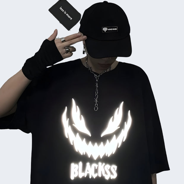 Man wearing black reflective T-shirt techwear