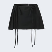 Black mini skirt with bow and thigh closure