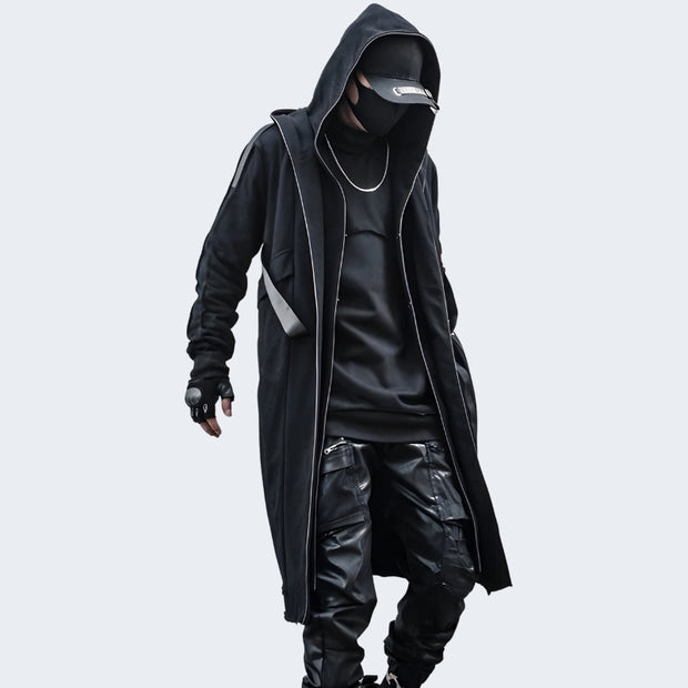 Man wearing black techwear coat with double Hood
