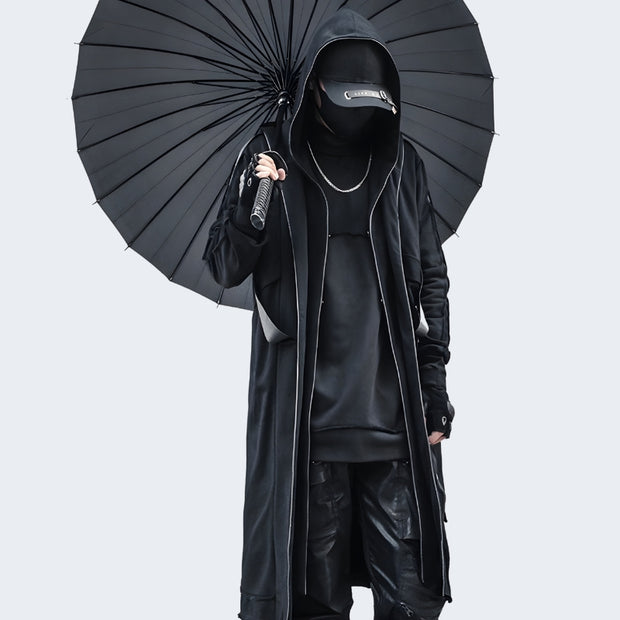 Man wearing black techwear coat zipper closure