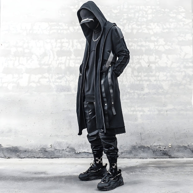 Man wearing black techwear coat multi pocket