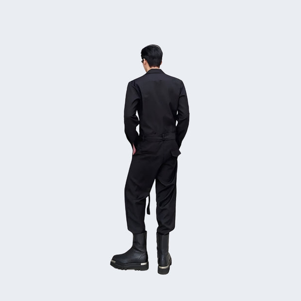 Man wearing black techwear overall with waist belt