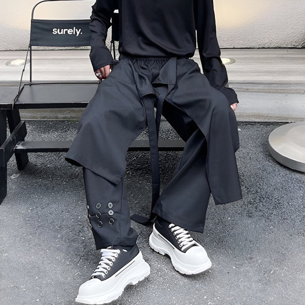 Front side man wearing black hakama pants multiple layers