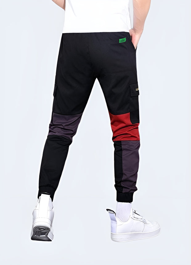 Unisex wearing red techwear pants adjustable straps