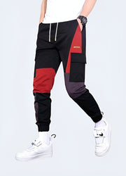 Unisex wearing red techwear pants adjustable straps