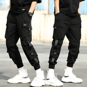 Unisex wearing black techwear track pants perfect blend of function and fashion