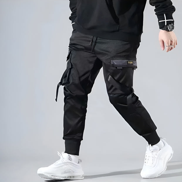 Techwear left side man wearing black cargo pants