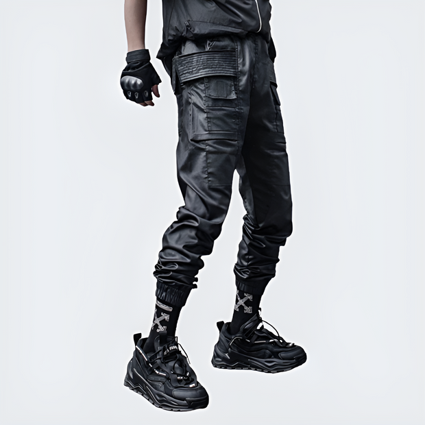 Man wearing black bybb waterproof techwear pants elastic Waist