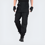 Man wearing airborne surplus cargo pants multiple pockets on both sides