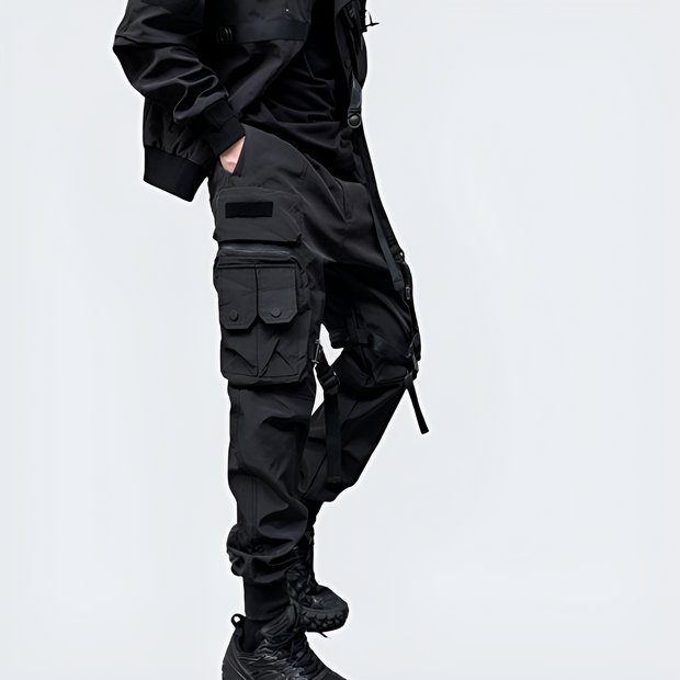 Man wearing black paratrooper pants elastic waist
