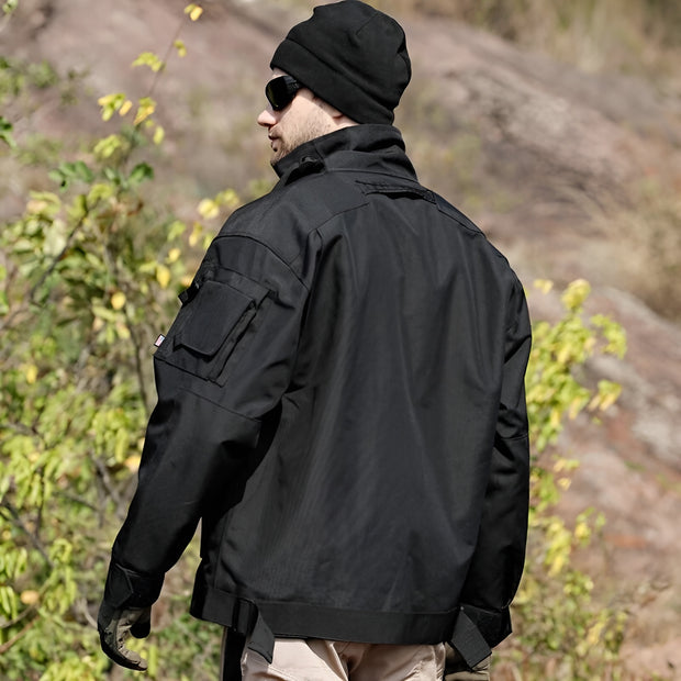 Man wearing black tactical waterproof jacket multiple pockets decoration