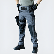 Man wearing grey tactical pants waterproof water resistant