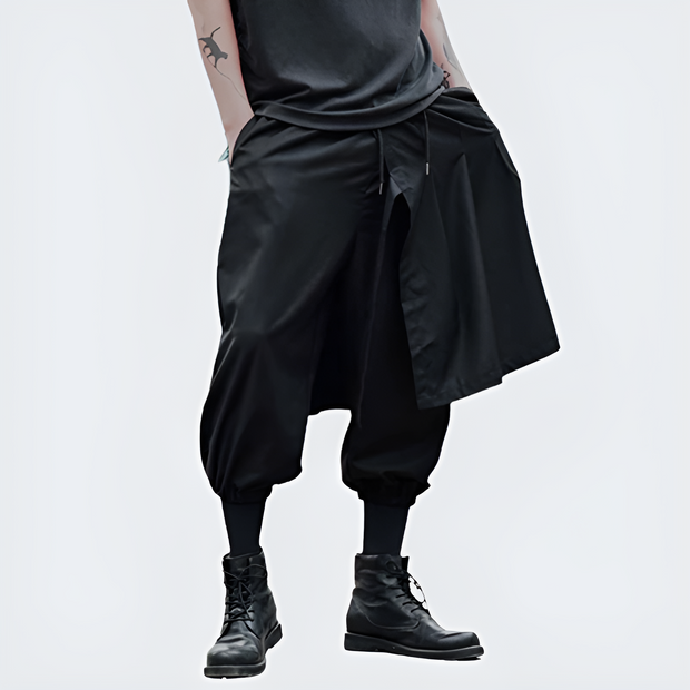 Man wearing black ninja pants extra loose fit