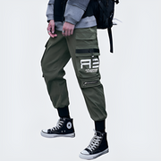 Green techwear pants multiple pockets and zippers on the side