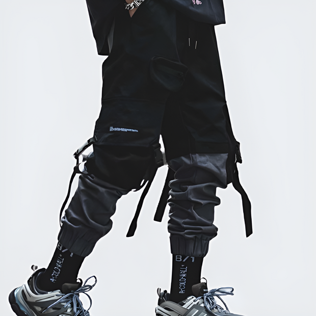 Man wearing Black Warcore Cargo Pants with straps