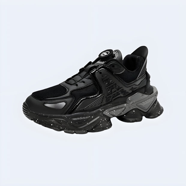 Front view of black techwear men’s shoes – UK model, sleek design with breathable mesh, reinforced sole and urban tactical aesthetics.