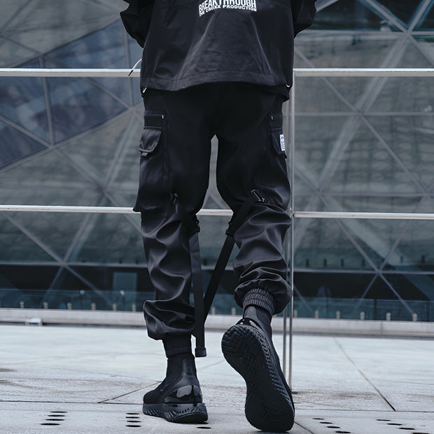 Multiple pockets on both sides strapped cargo joggers black