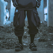Unisex wearing black techwear ninja pants elastic waist