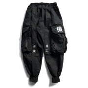 Unisex wearing black big multi pocket techwear baggy pants