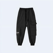 Unisex wearing black big multi pocket techwear baggy pants