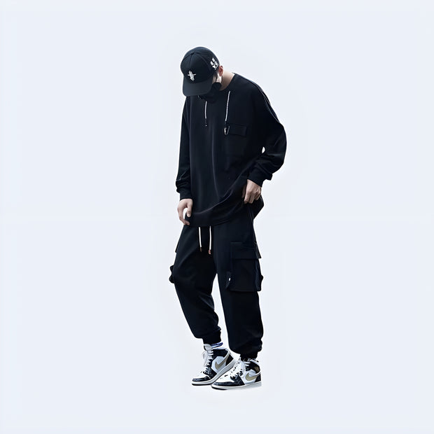 Unisex wearing black big pocket techwear baggy pants
