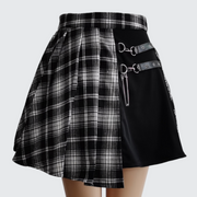 Women wearing black pleated style skirt