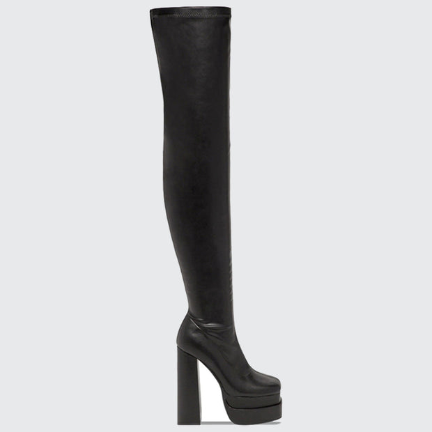 Women wearing black knee high type boots