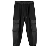 Unisex wearing black skinny jogger pants sleek