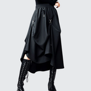 Women wearing black goth long style skirt