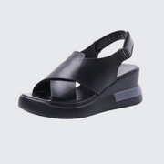 Unisex wearing black buckle strap closure sandals