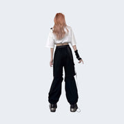 Women wearing black adjustable hollow trousers