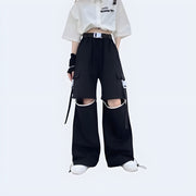 Women wearing black adjustable hollow trousers