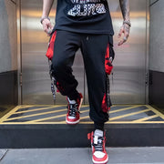 Red and black techwear pants multiple pockets on both sides