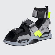 Unisex wearing grey buckle strap closure sandals