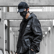 Unisex wearing black multi pocket anorak jacket multiple pockets decoration