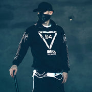 Man wearing black new cyberpunk hoodie elastic on ends of sleeves