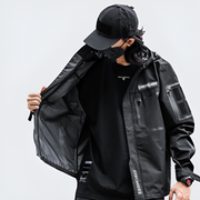 Man wearing black tactical jacket zipper closure
