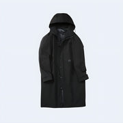 Man wearing black techwear trench coat single Breasted closure